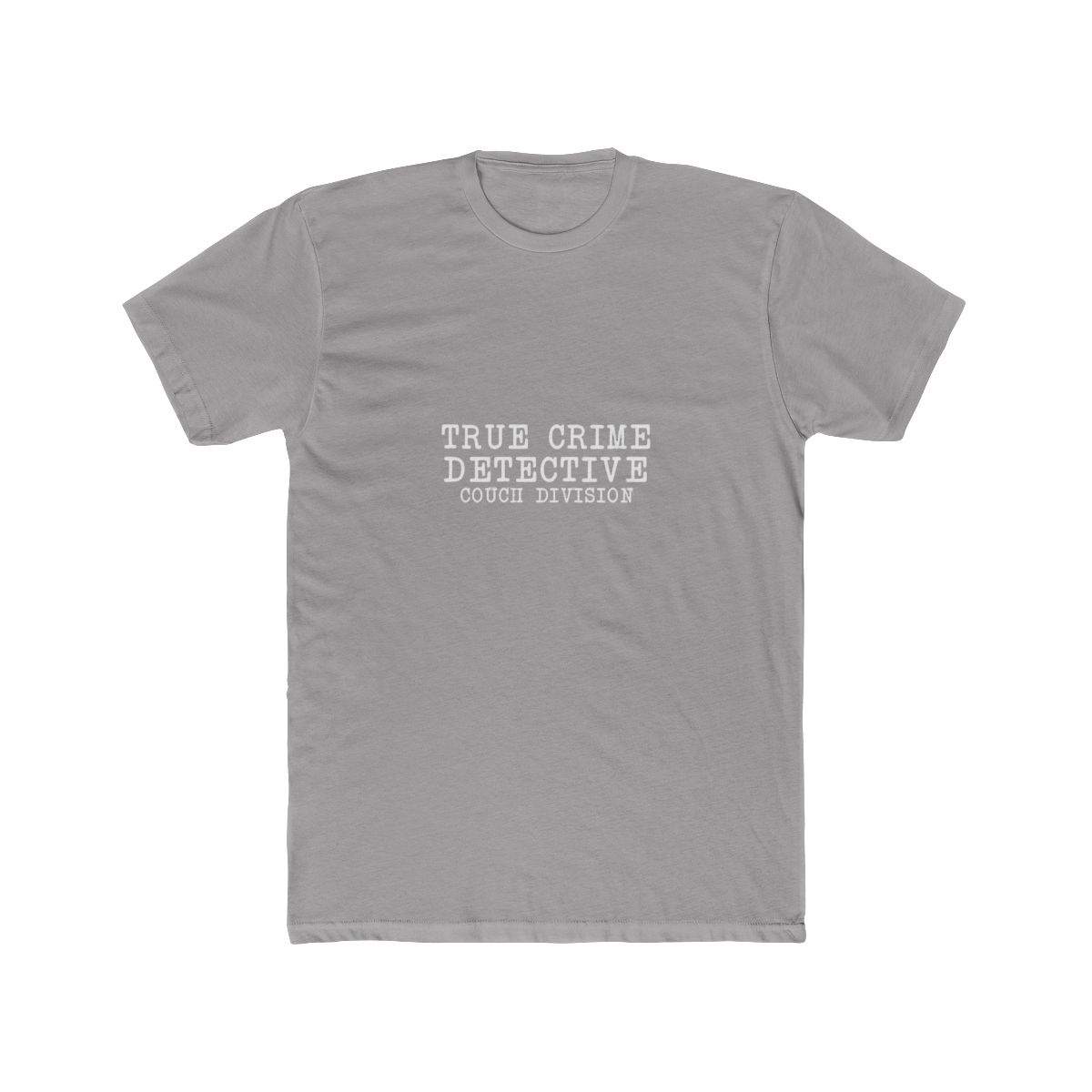 A grey T Shirt with the white text "TRUE CRIME DETECTIVE COUCH DIVISION". A gold-coloured necklace with a pendant lies on the shirt. A brown hat is partially visible in the upper left corner